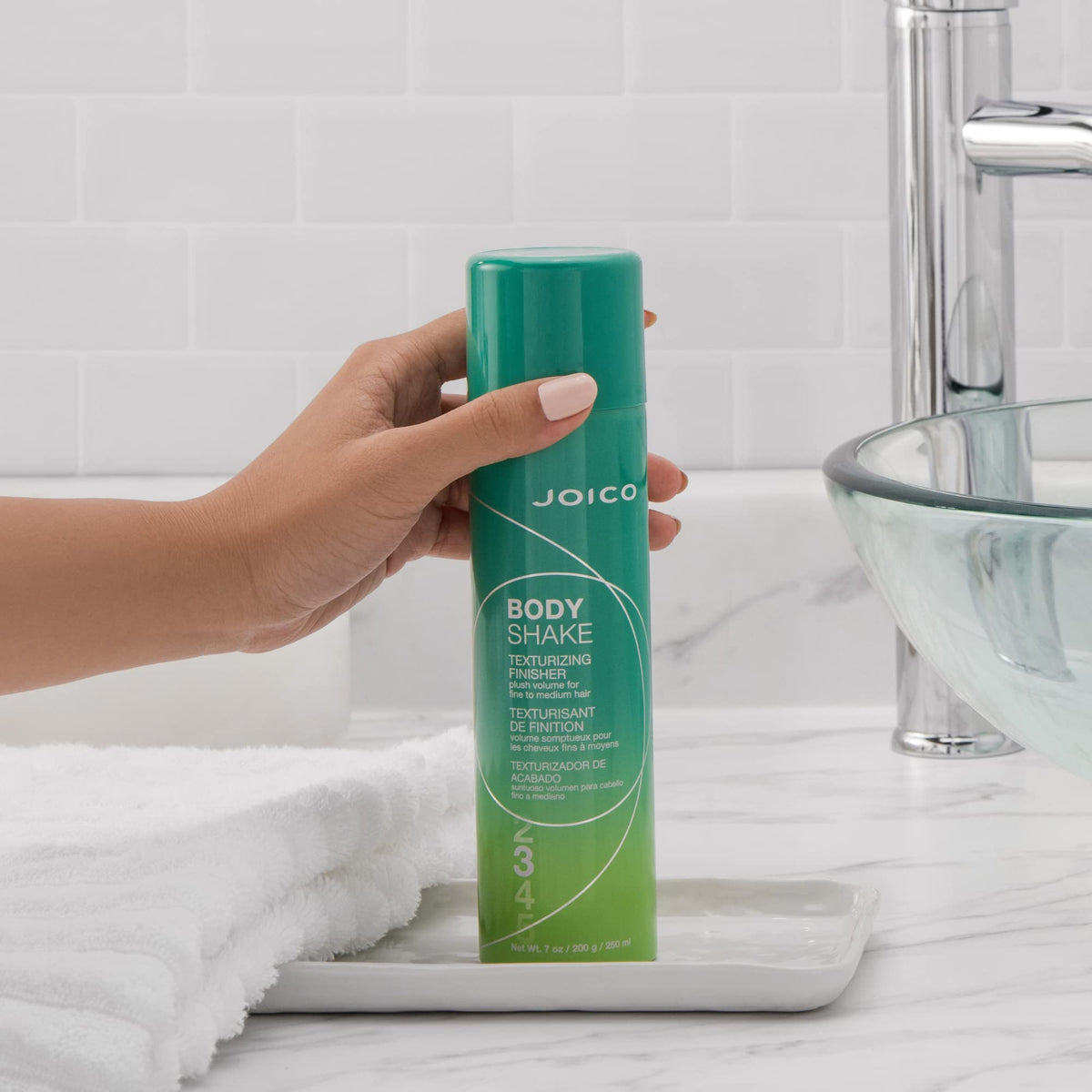Joico 250mL size comparison demonstrating portable salon volume