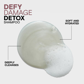 Joico shampoo lather in hand during shower for deep cleanse