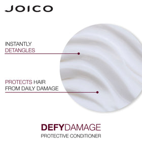 Joico bottles next to hand for scale demonstrating travel-friendly sizes