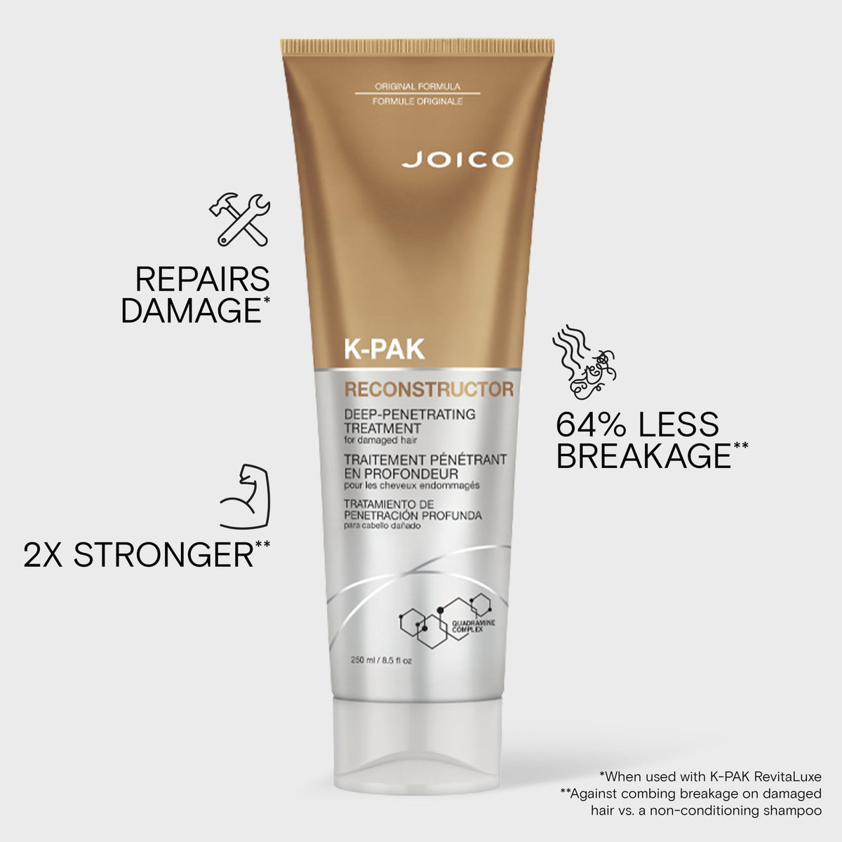 Hands applying Joico K-PAK Reconstructor to damp hair demonstrating easy five-minute use