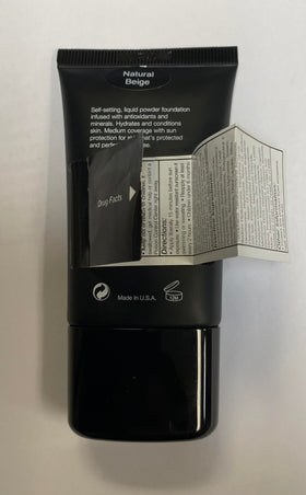 JOLIE bottle in hand illustrating 1 fl oz size for travel and convenience benefit
