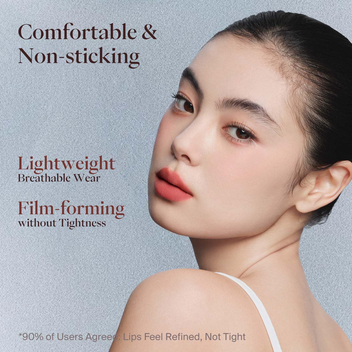 Joocyee lips in daylight wearing Dancing Red, bold natural-looking color