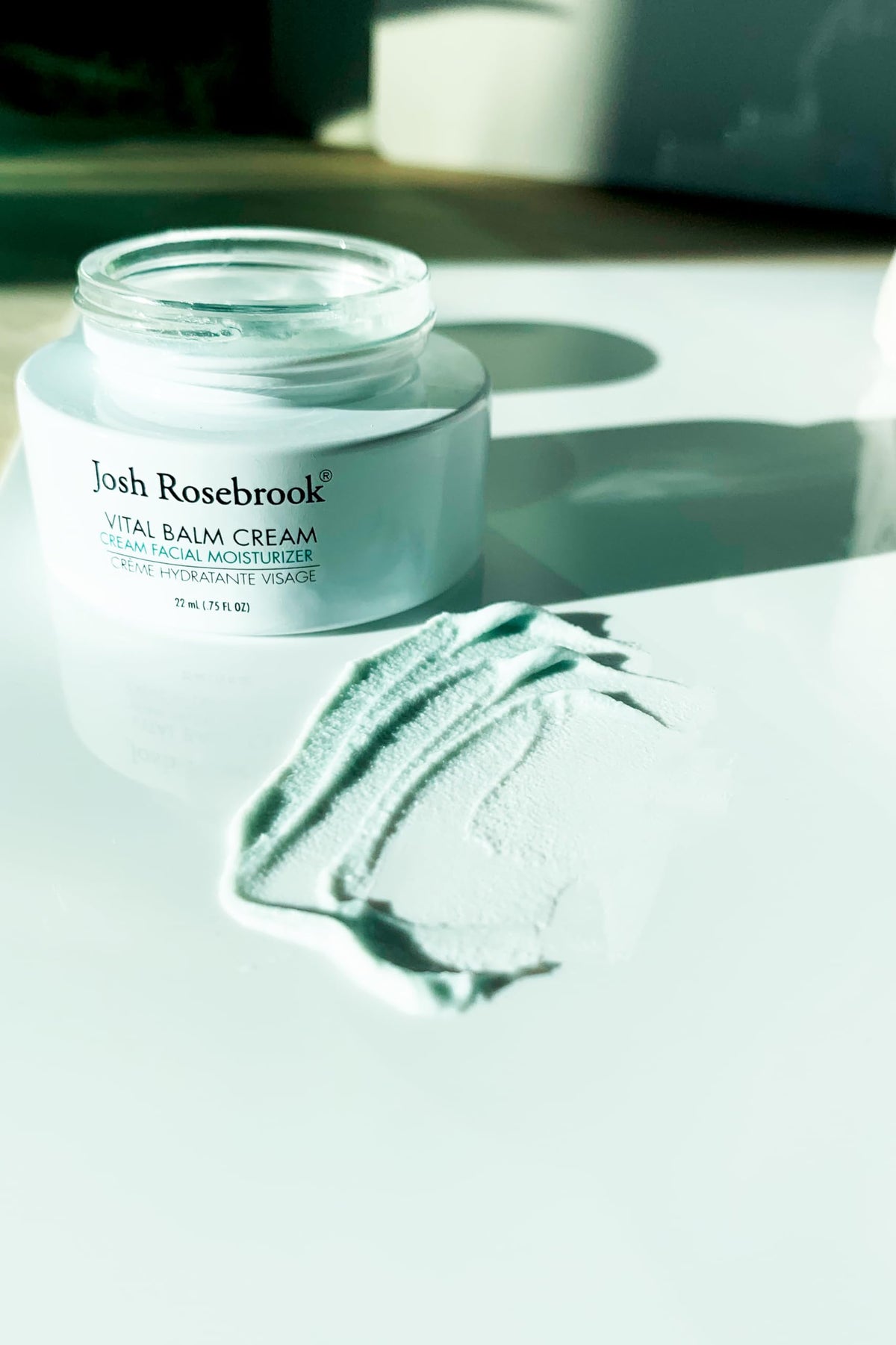 Josh Rosebrook cream on fingers demonstrating easy spreadability and absorption