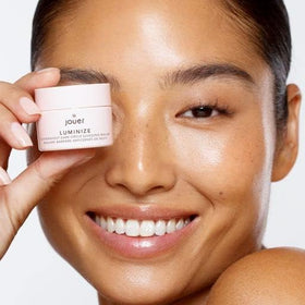 Jouer under‑eye application showing gentle patting and smoothing effect