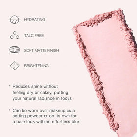 Jouer powder applied with brush under eye for visible brightening benefit