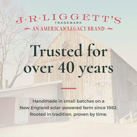 J·R·LIGGETT'S shampoo bars on bathroom shelf in a natural lifestyle scene