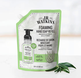 Foamy lather dispensed from J.R. Watkins refill demonstrating gentle cleansing
