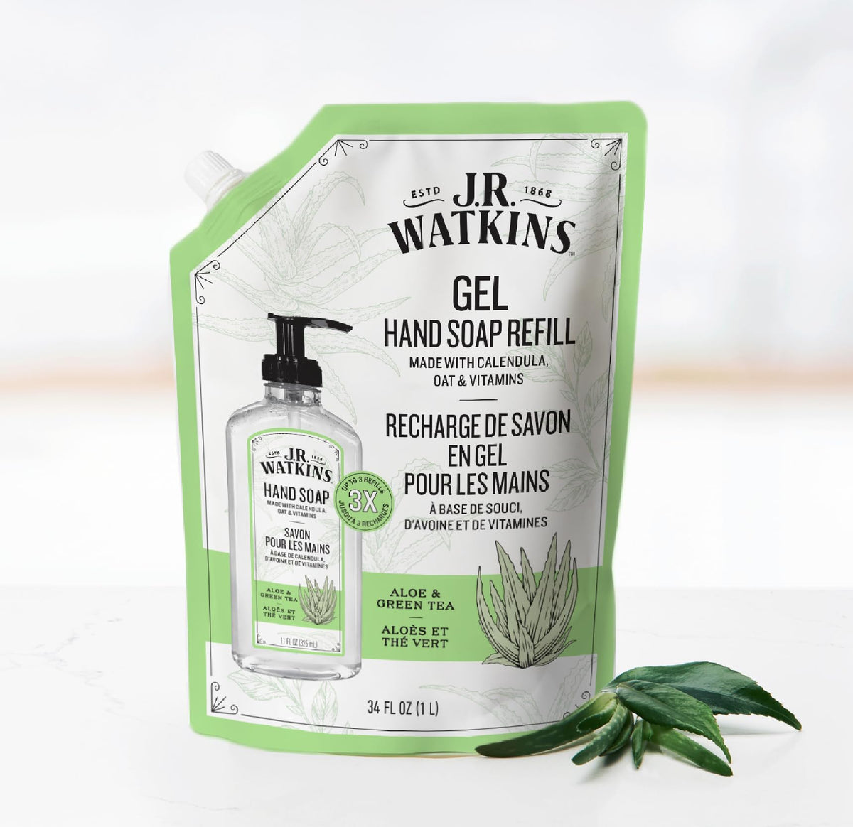 J.R. Watkins label close-up highlighting aloe and green tea benefits