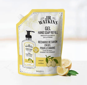 J.R. Watkins pouring refill into dispenser for easy bottle top-up