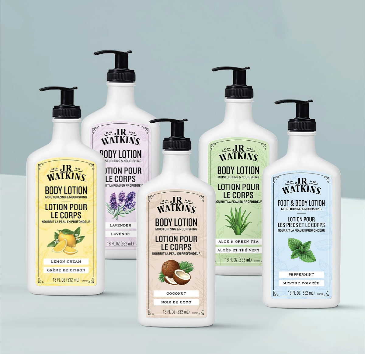 J.R. Watkins bottle next to hand showing 18 fl oz size scale
