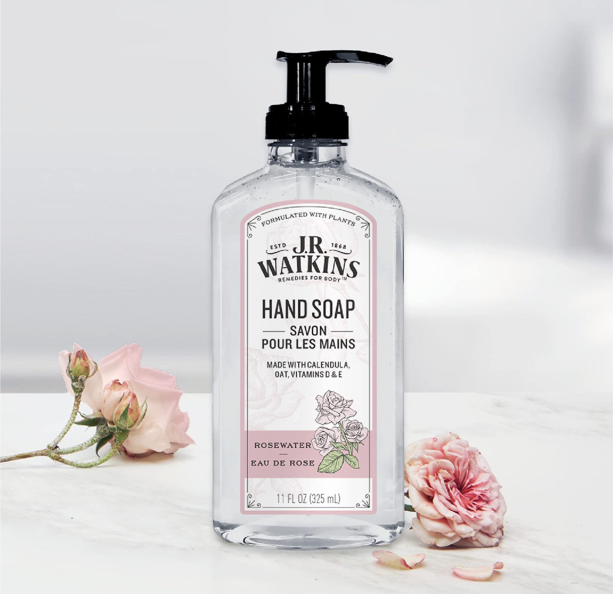 Person using J.R. Watkins rosewater gel at kitchen sink for clean, lightly scented hands