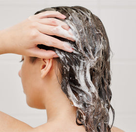 J.R. Watkins pump close-up revealing smooth shampoo texture and lather