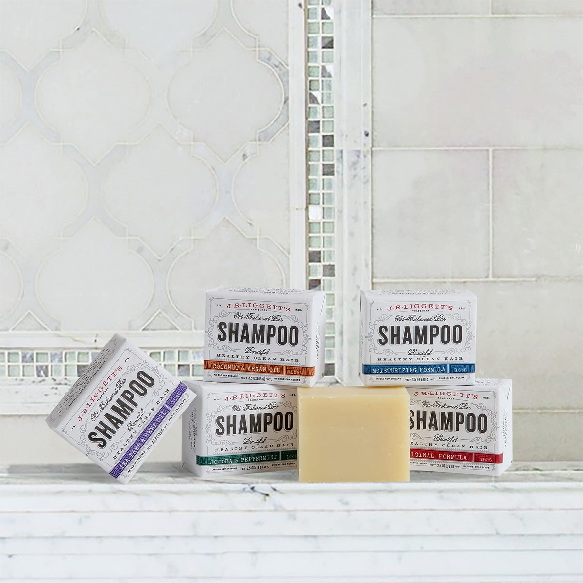 J·R·LIGGETT'S bar in hand illustrating compact size, perfect for travel