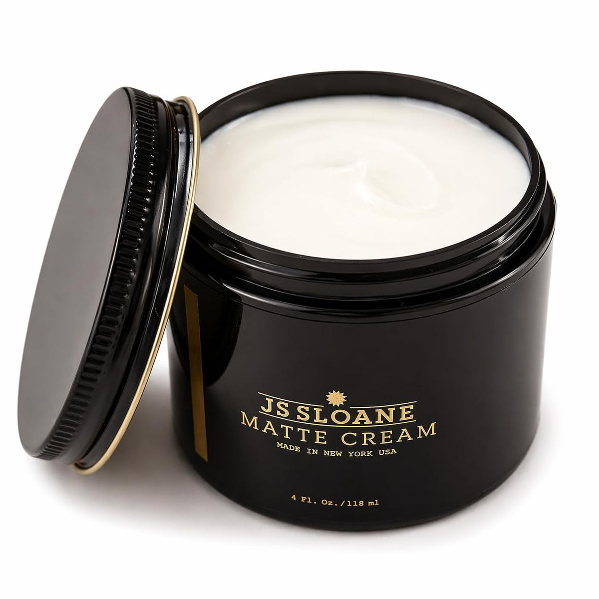 JS Sloane cream texture close-up illustrating smooth, non-greasy consistency