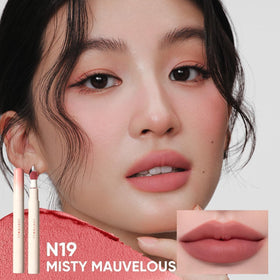 JUDYDOLL texture swipe on arm showing silky, buildable pigment and smooth finish