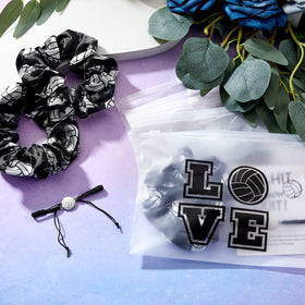 Juexica lifestyle photo of teammates wearing scrunchies and bracelets promoting team unity