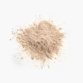 Juice Beauty close-up of ultra-fine powder texture highlighting blurring benefit