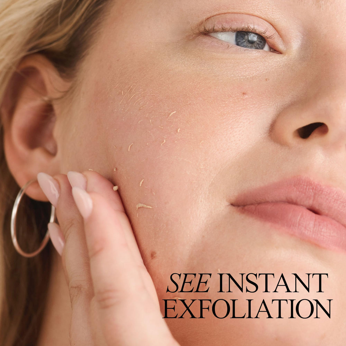 Juice Beauty spray action captured mid-spray showing easy application benefit