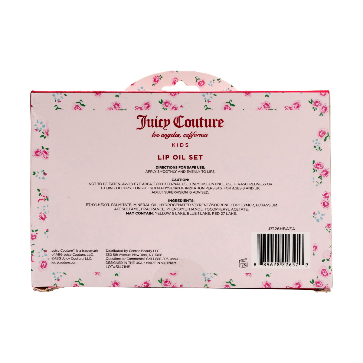 Juicy Couture close-up of lip oil texture on applicator showing smooth glide