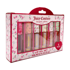 Juicy Couture six-pack arranged flatlay highlighting variety and pretty tubes