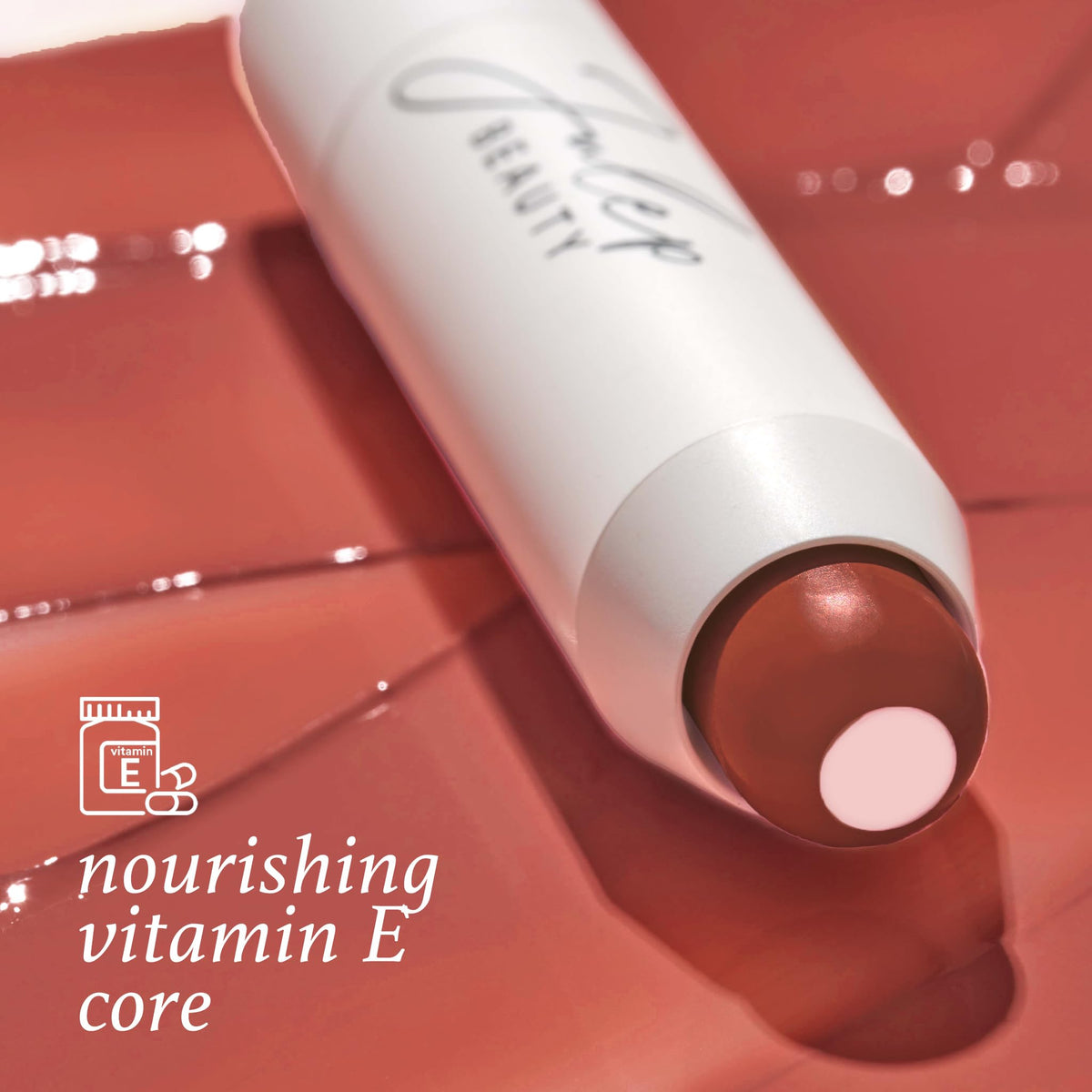 Model applying Julep It's Balm Burnt Sienna showing buildable color benefit