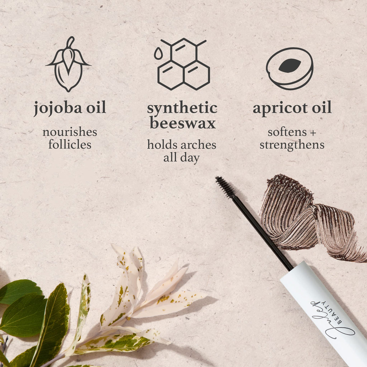 Julep stroke swatch on skin showing taupe buildable color and blending