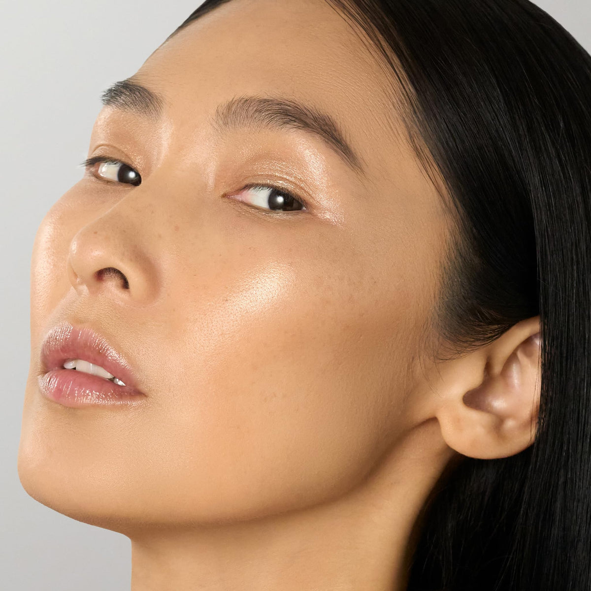 Julep highlighter swiped on eyelid creating subtle brightening effect