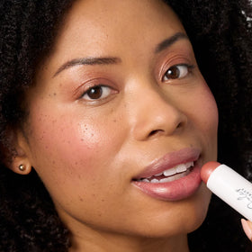 Julep cheek application in hand illustrating quick finger-blendable flush
