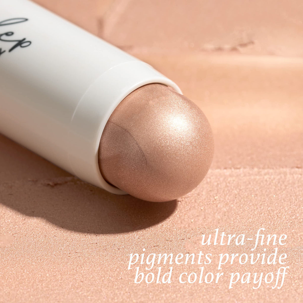 Julep highlighter on cheekbones in use for natural luminous radiance