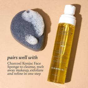 Julep in-hand application massaging face, demonstrates gentle makeup removal