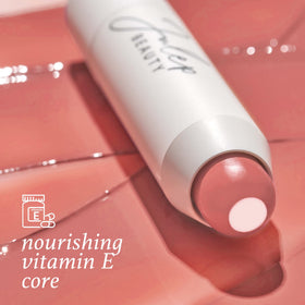 Julep tinted balm on lips showing natural glossy finish benefit