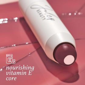 Close-up of Julep balm texture highlighting creamy, hydrating formula benefit