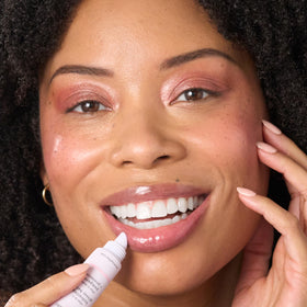 Julep gloss on model lips highlighting glossy shine and volumizing effect