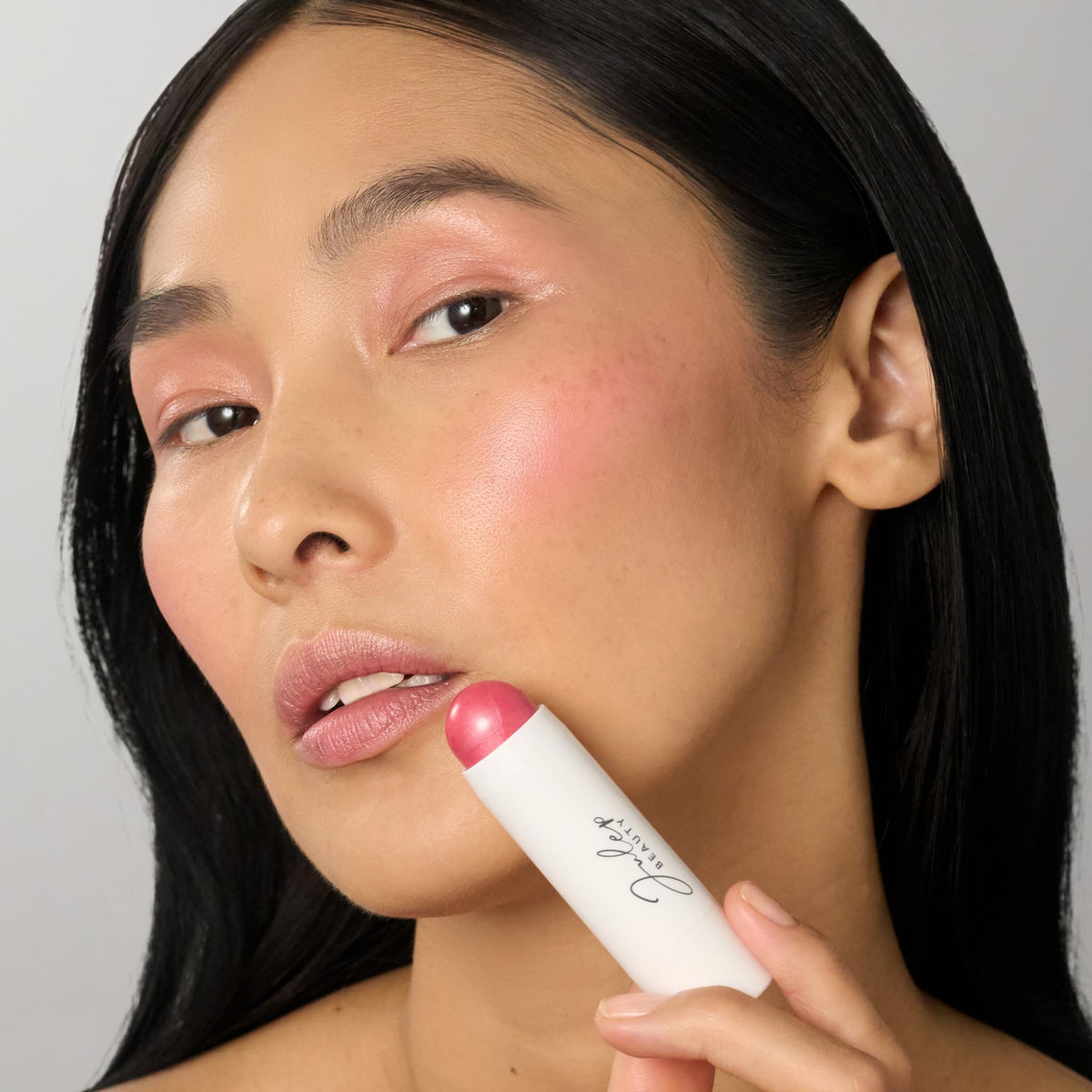 julep on skin swatch of peony pink showing true color payoff and blendability