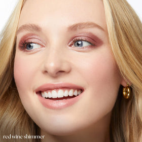 Julep close-up eye on model wearing Red Wine Shimmer showing crease-free shimmer benefit