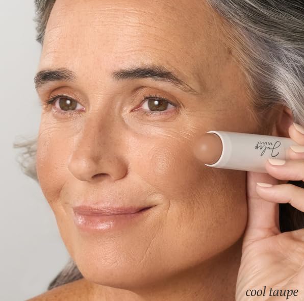 Julep stick held in hand to show scale and travel-friendly size