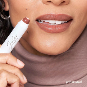 Julep swatch on arm showing buildable 90's Neutral color payoff benefit