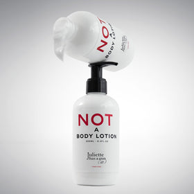 Juliette Has A Gun body lotion applied to forearm lifestyle scene for daily moisturizing benefit