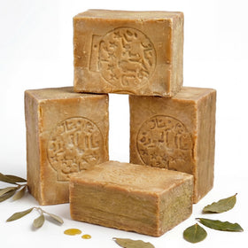 JUSIZA Aleppo soap four-pack front packaging showing natural bars and labeling, benefits longevity