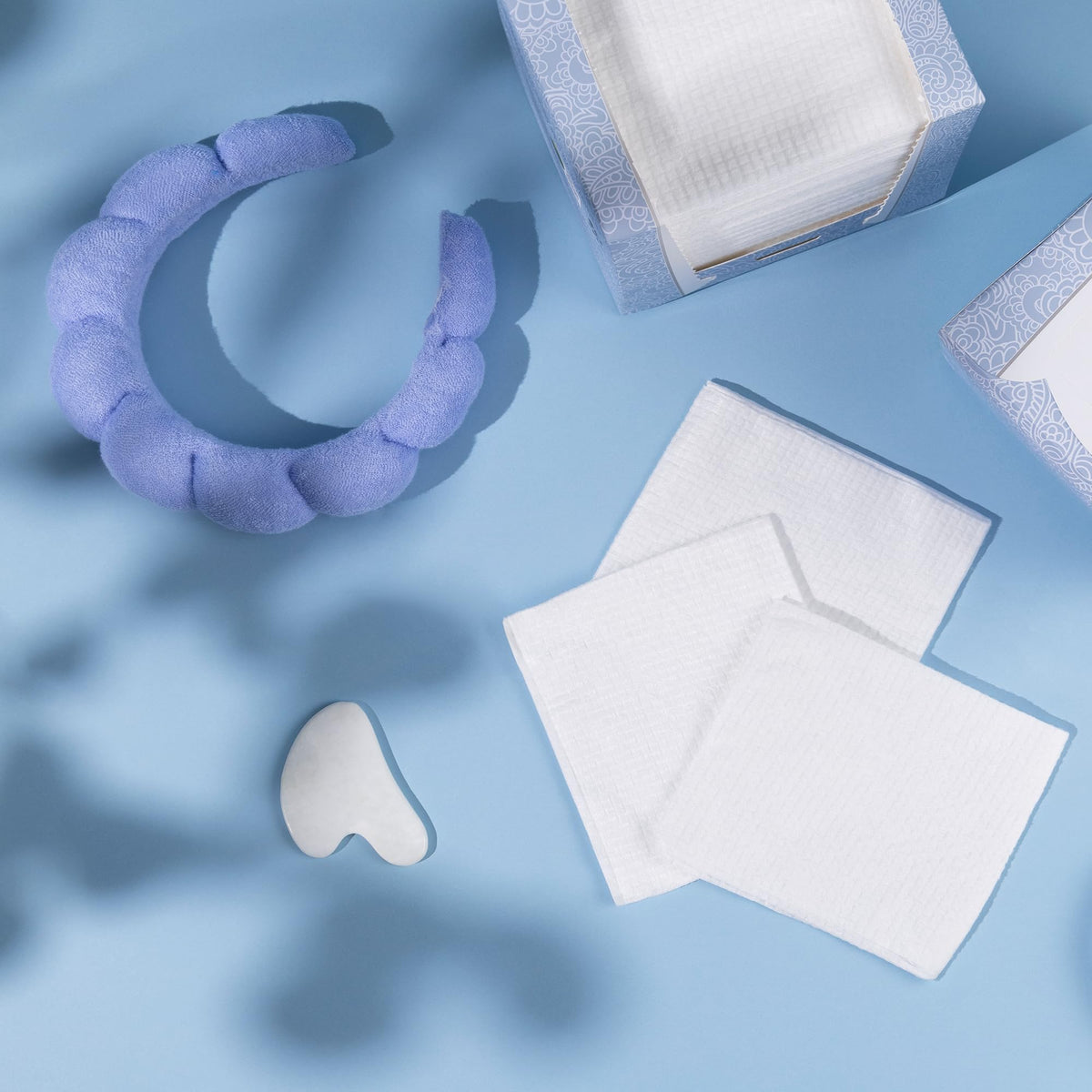 Just Clean Skin open pack with stacked towels emphasizing disposable, hygienic convenience