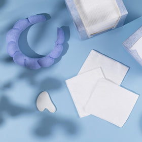 Just Clean Skin open pack with stacked towels emphasizing disposable, hygienic convenience