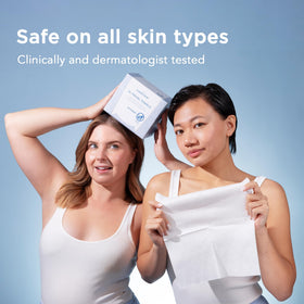 Just Clean Skin towel in hand showing scale and extra-large coverage for faster routines