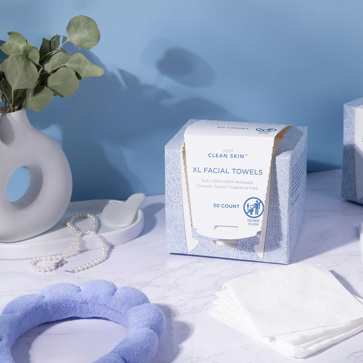 Just Clean Skin towel inside travel pouch demonstrating portability and on-the-go freshness