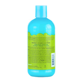 Just For Me Curl Peace shampoo poured into hand highlighting creamy texture and easy slip