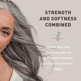 Just Nutritive conditioner being applied to gray hair demonstrating smooth application