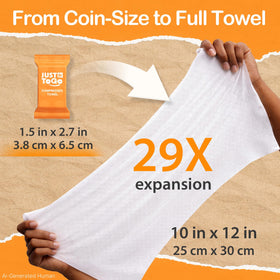 JUST TO GO coin beside a wallet for scale to show portability