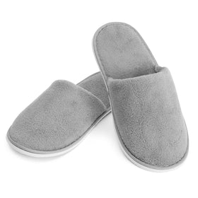 Juvale slippers arranged in hotel room conveying guest-ready comfort