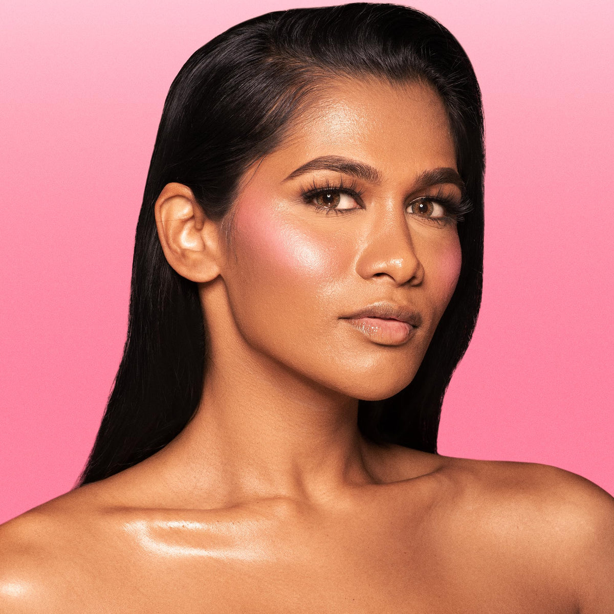 Juvia's Place applied on cheek demonstrating warm lifted color benefit