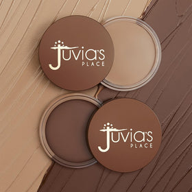 Juvia's Place angled brush applying amber bronzer for precise contouring benefit