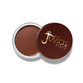 Juvia's Place arm swatches of amber demonstrating buildable warm pigmentation